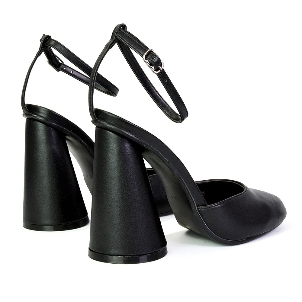 Ekin Ankle Strap Closed Toe Statement Cylinder Block Heel In Black